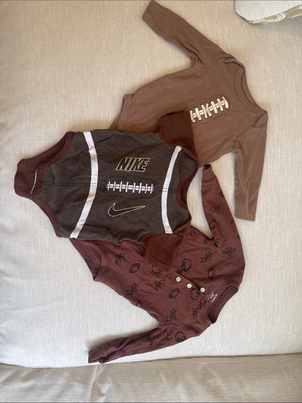 Nike Brown Football-Themed Baby Bodysuit Trio